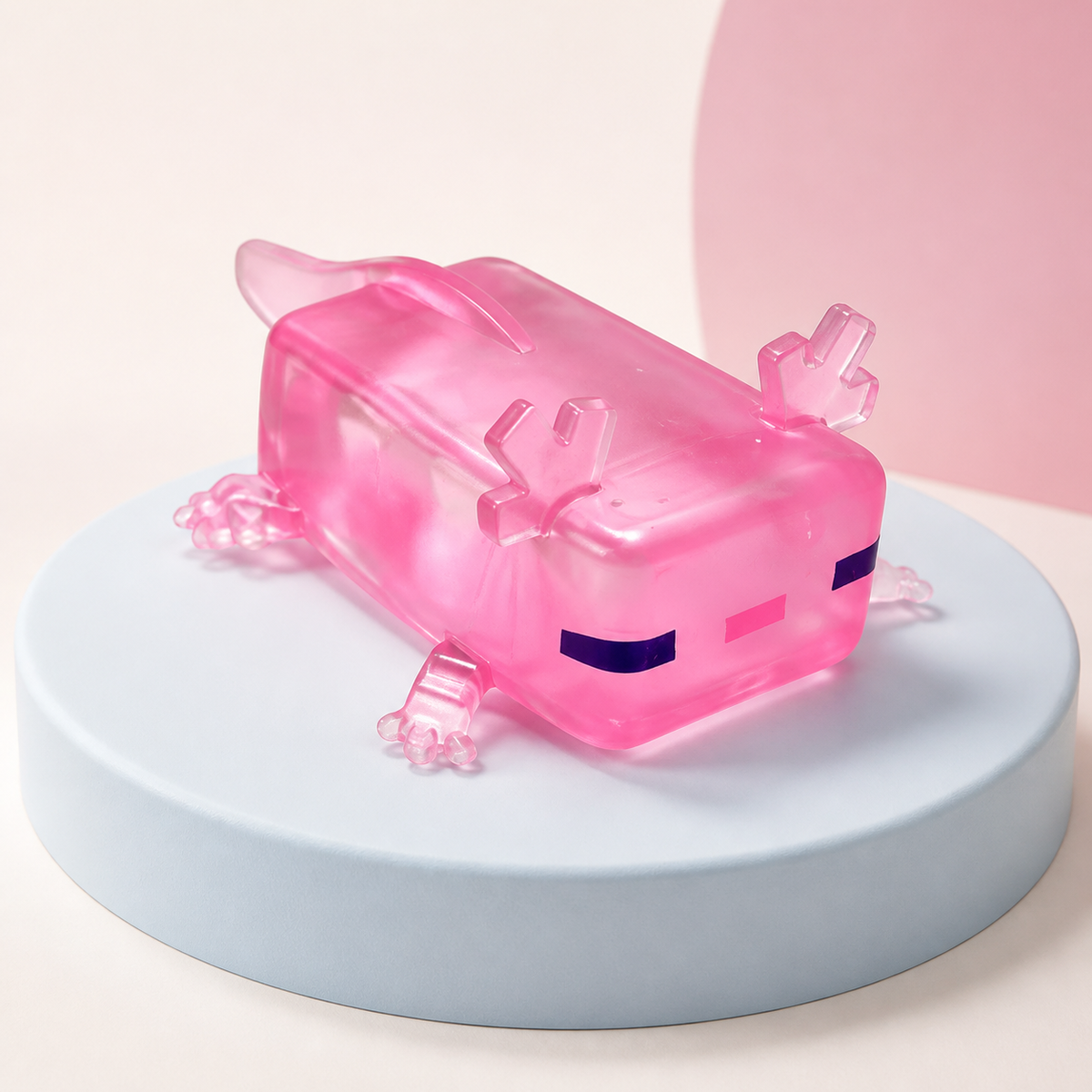 Squishy ajolote rosado transparente en fotografia de estudio